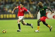 ACCRA, GHANA - FEBRUARY 10:  Ahmed Hassan of Egypt (L) and Gilles Augustin Binya of Cameroon vie for the ball during the AFCON Final match between Cameroon and Egypt at the Ohene Djan Stadium in Accra, Ghana.  (Photo by Lee Warren/Gallo Images/Getty Images)